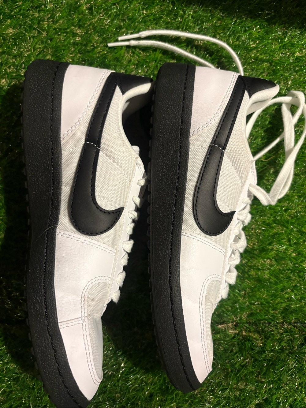 Nike White and Black Low-Top Swoosh Sneakers